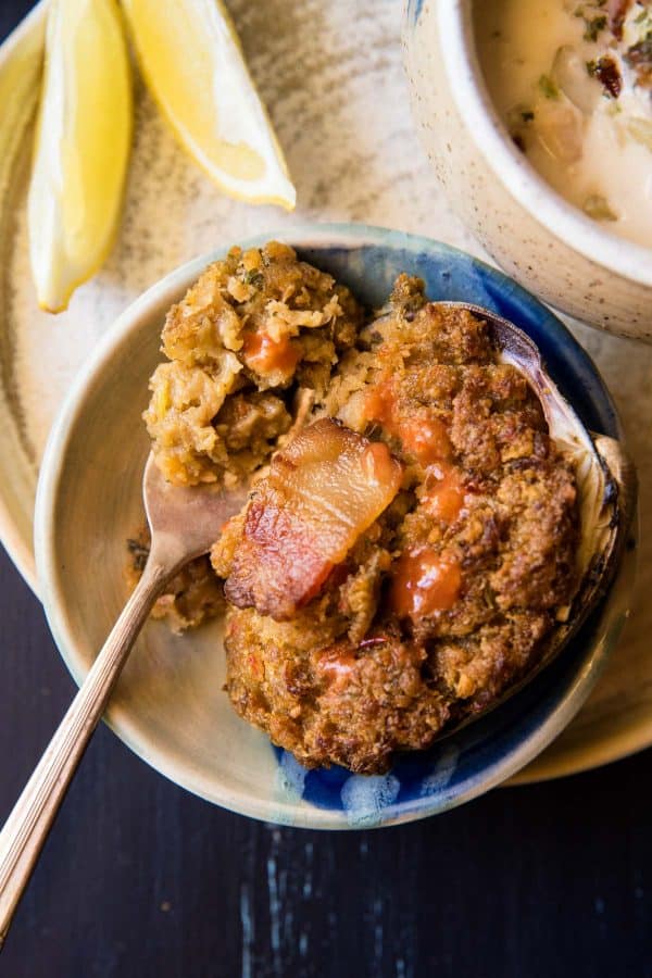 hot sauce on top of baked stuffed clam