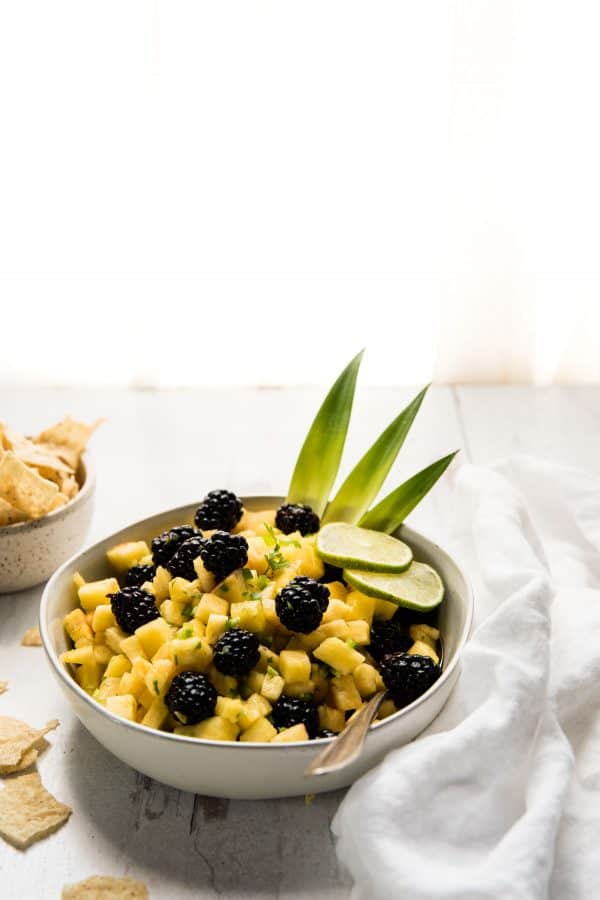 side angle of bowl of pineapple salsa