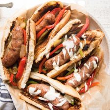 overhead photos of a platter of sausage sandwiches