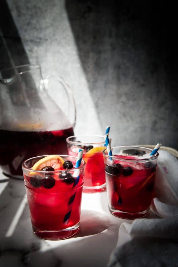 side angle of blueberry lemonade in glasses