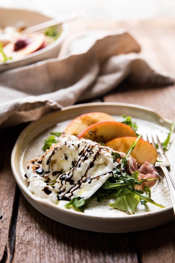 balsamic vinegar drizzled over burrata cheese