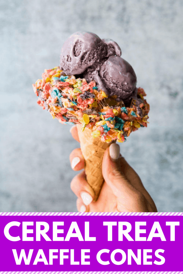 hand holding purple ice cream waffle cone