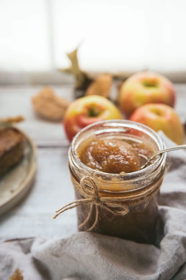 side angle of apple butter in a mason jar