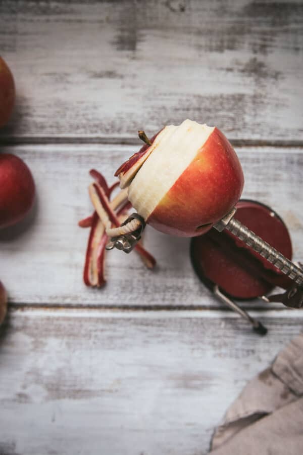 apple being peeled and sliced