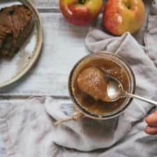 spoon scooping out of a mason jar