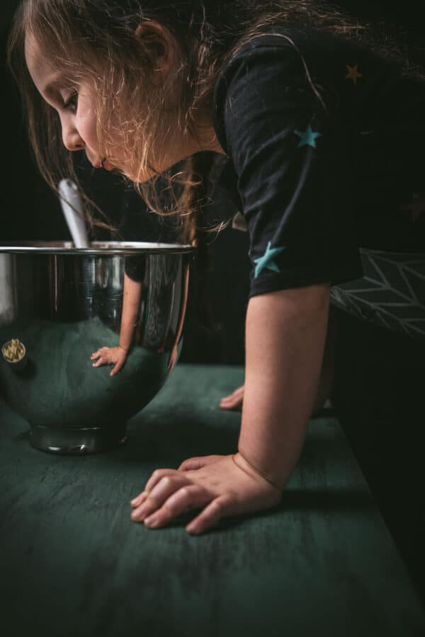 kid staring into mixing bowl