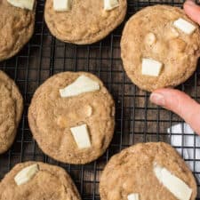 white chocolate topped cookies on a wire rack