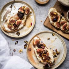 overhead of toast with figs on plates