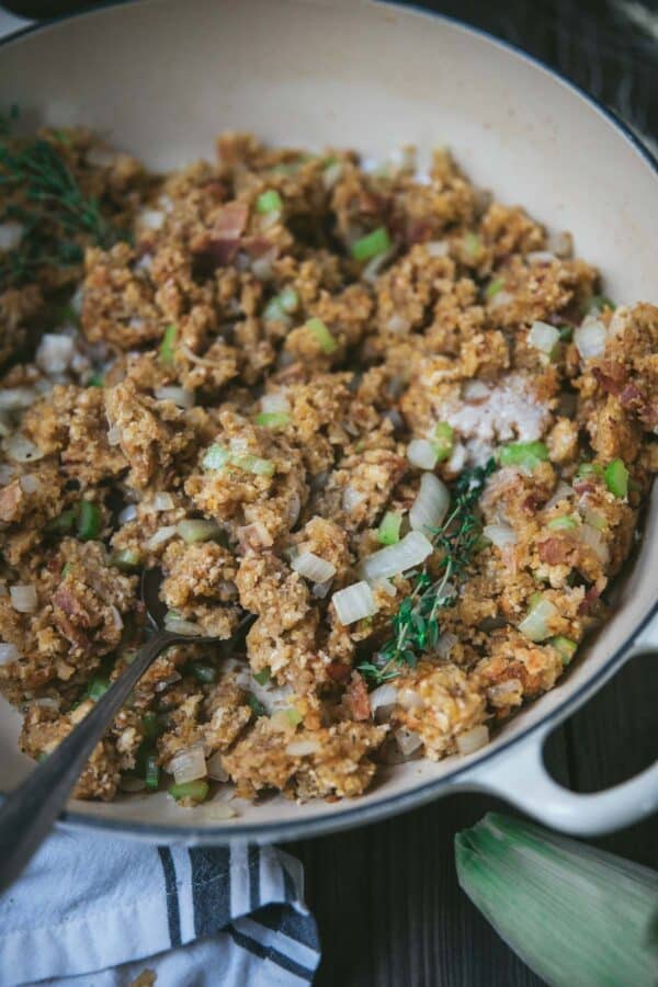 close up of spoon scooping cornbread stuffing