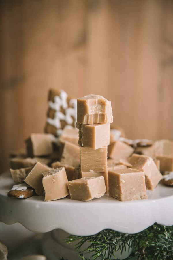 stacked pieces of fudge on a cake stand