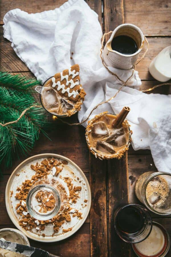 overhead of gingerbread white russians with plate for gingerbread rim