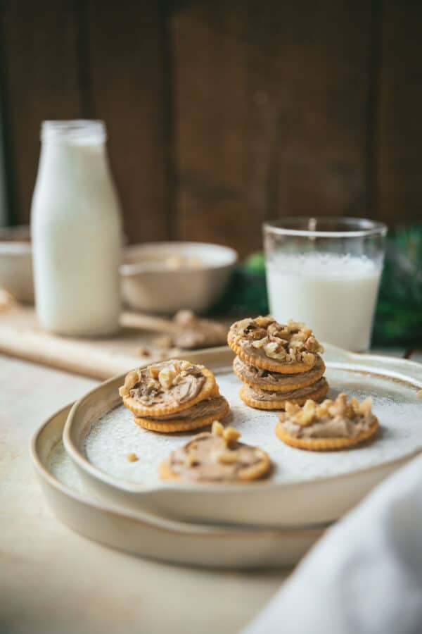 stacked frosted ritz crackers on plate