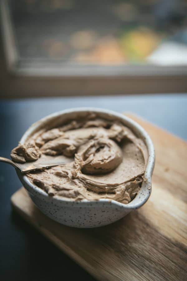 side angle of maple buttercream in a bowl