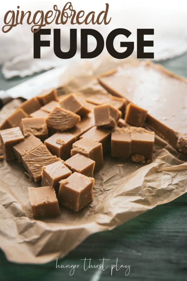 cut pieces of gingerbread fudge on a piece of parchment paper