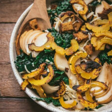 close up of roasted squad and pear on a salad