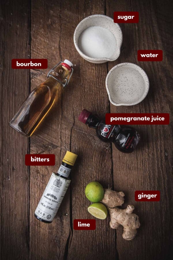 labeled ingredients for pomegranate ginger bourbon cocktail