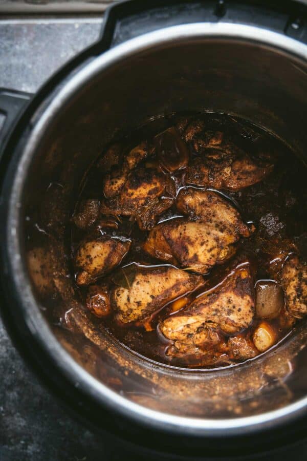 chicken thighs in braising liquid in the instant pot