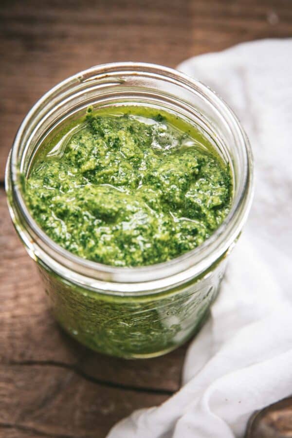 close up of pesto in jar