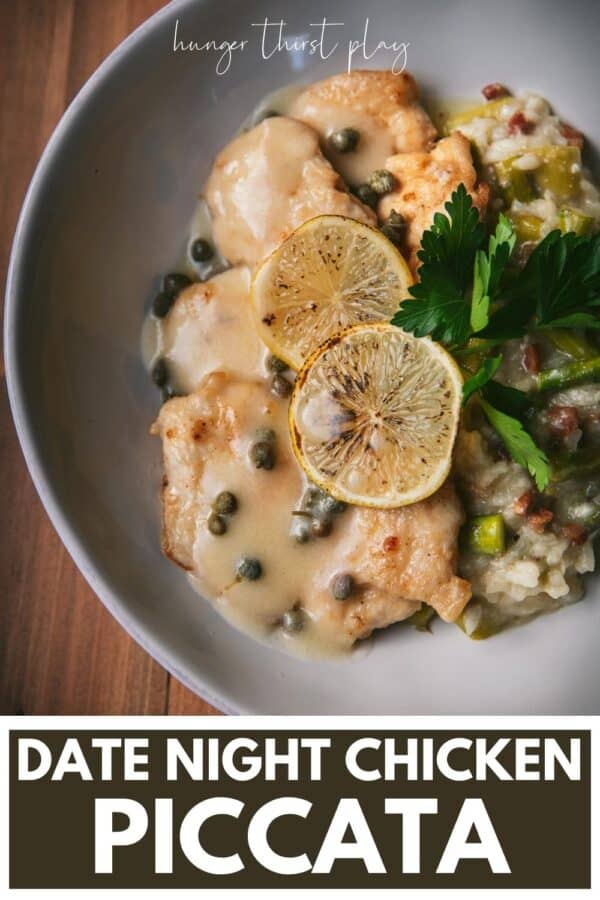 chicken with lemon and caper sauce in a plate over creamy asparagus risotto