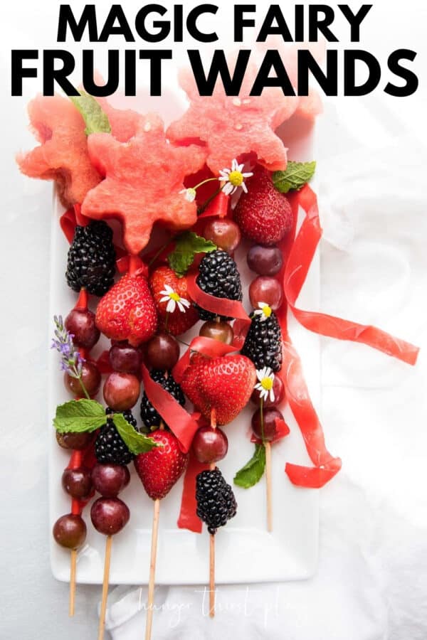 overhead shot of fruit on skewers to make pretend fairy wands