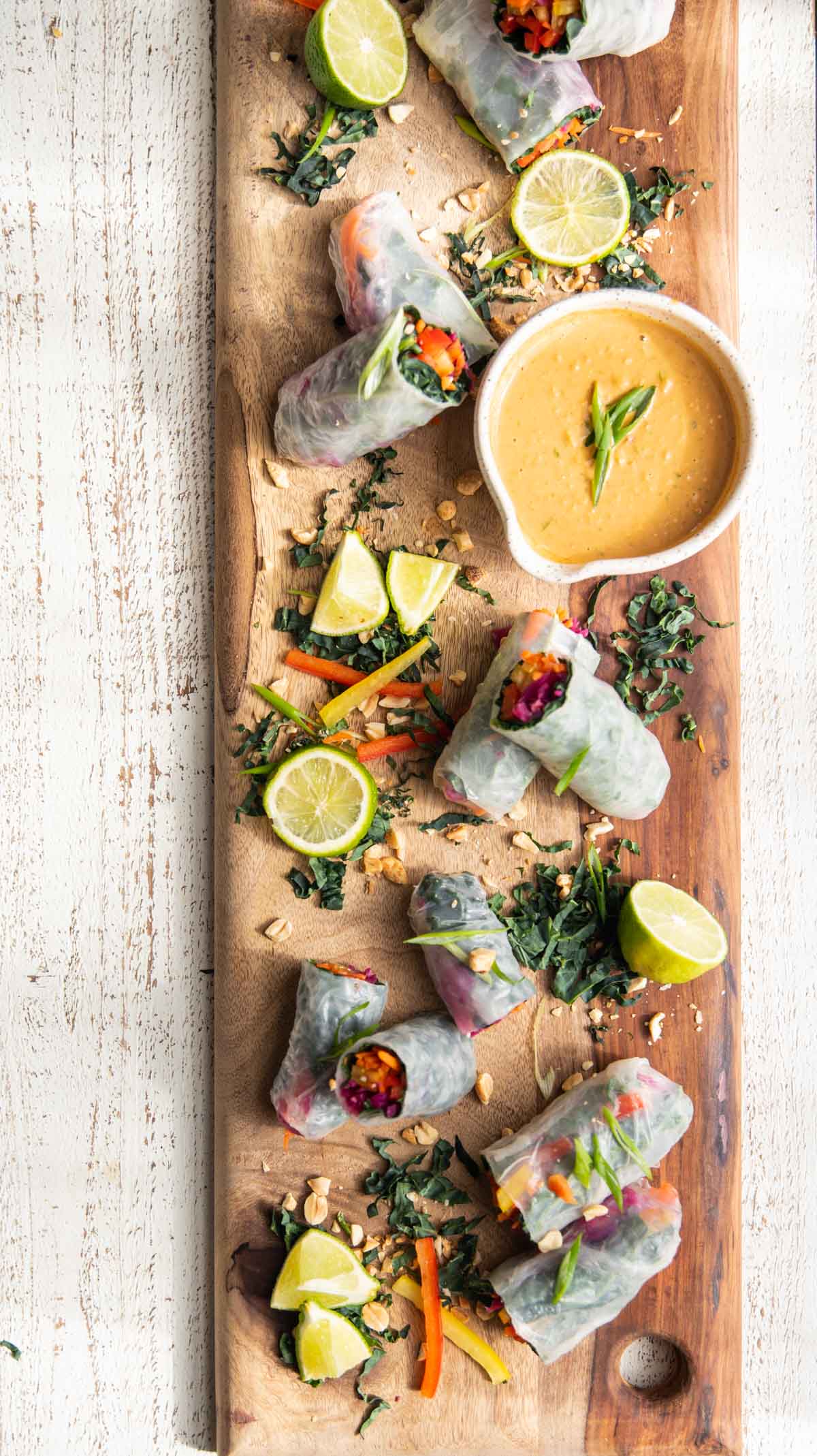 Rainbow Vegggie Spring Rolls on a wooden board