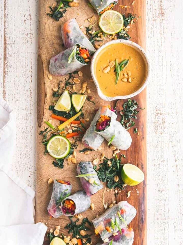 Rainbow Vegggie Spring Rolls on a wooden board