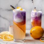 glasses layered with lemonade, sorbet, and empress gin
