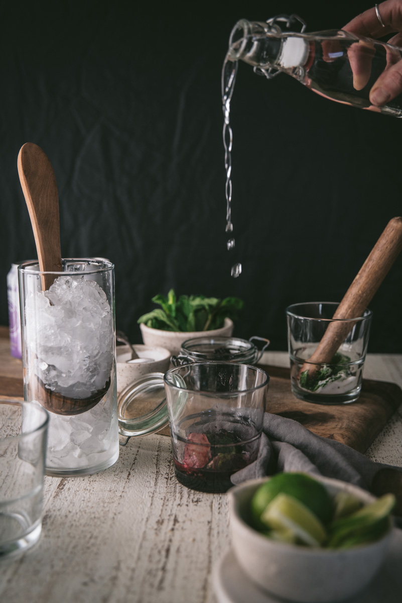 pouring rum into a glass