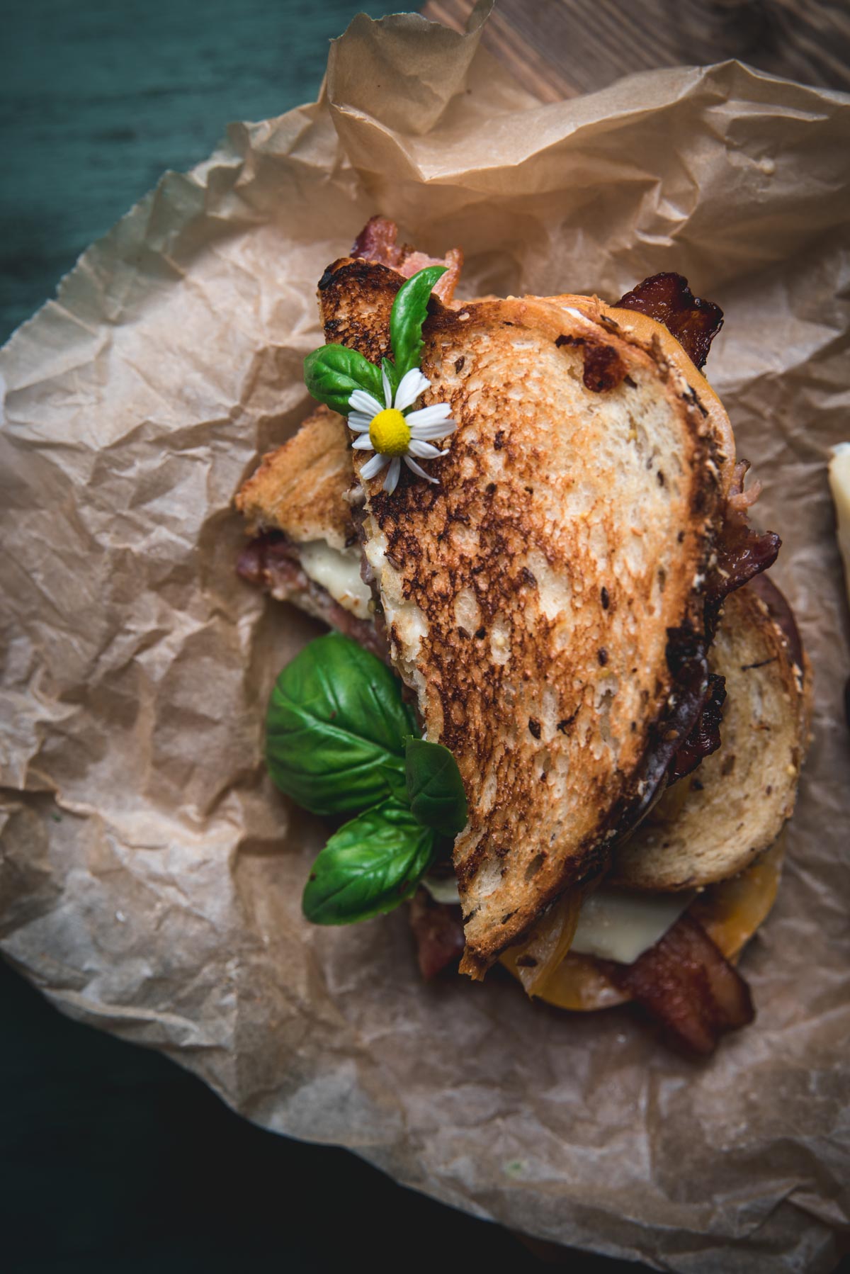 overhead angle of slices of melty sandwich stacked on top of each other