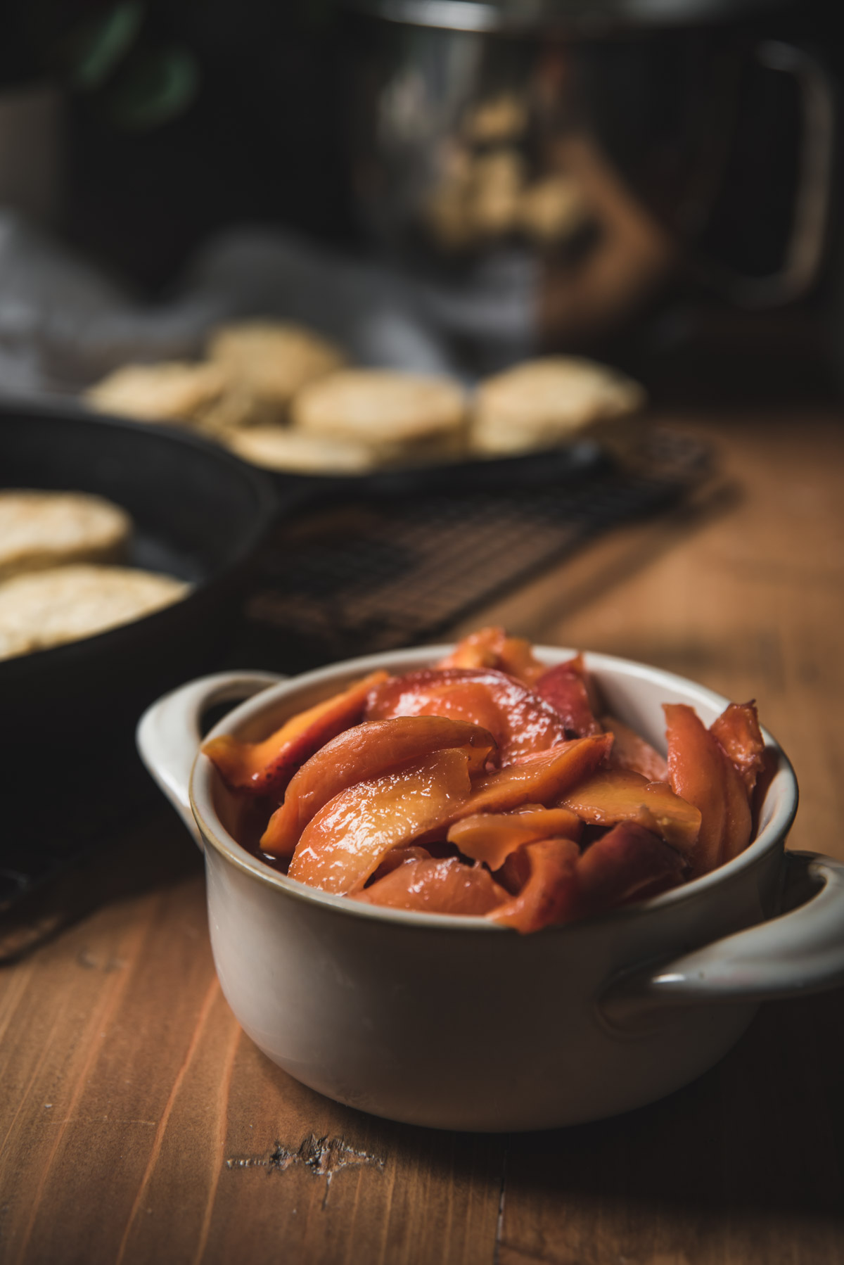 Sliced peaches that have been soaking in honey and whiskey overnight