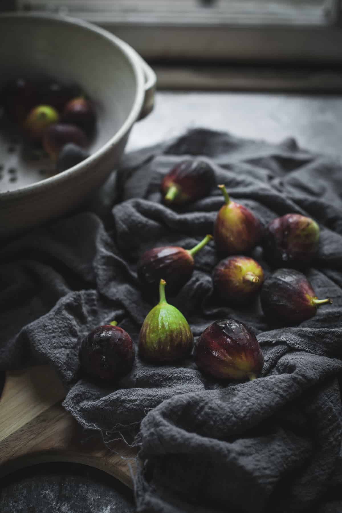 washed figs on a grey napkin