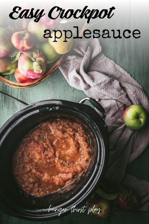 cooked apples in a crock pot blended into sauce