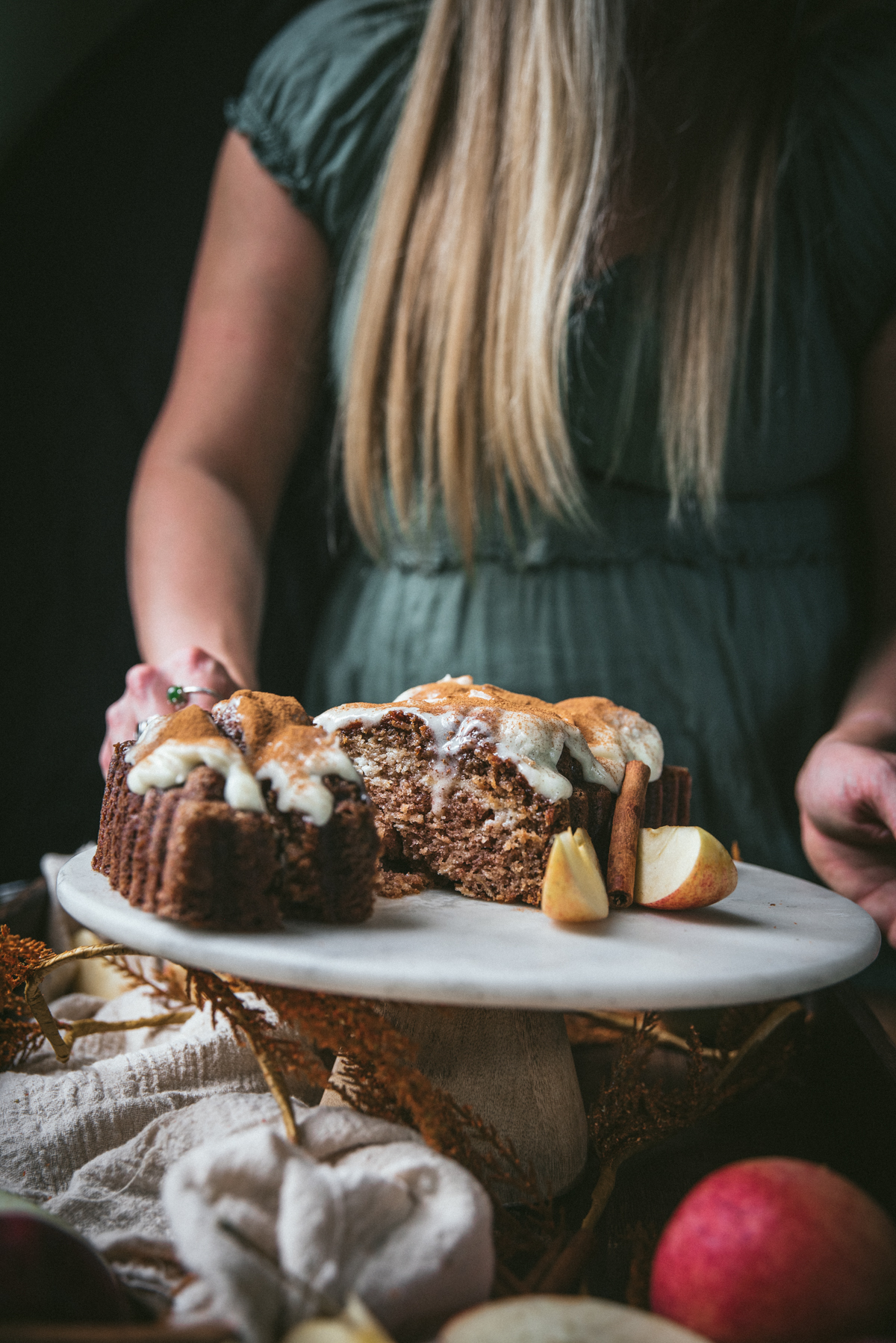 cutting slices of glazed apple loaf