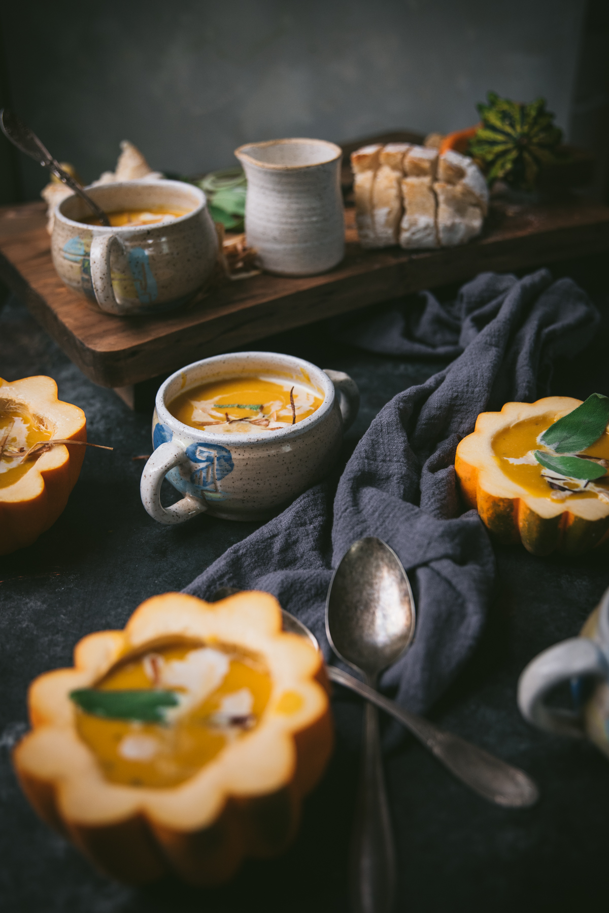 side angles of bowls of kabocha squash soup