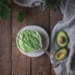 overhead angle of creamy green goddess dressing in a bowl