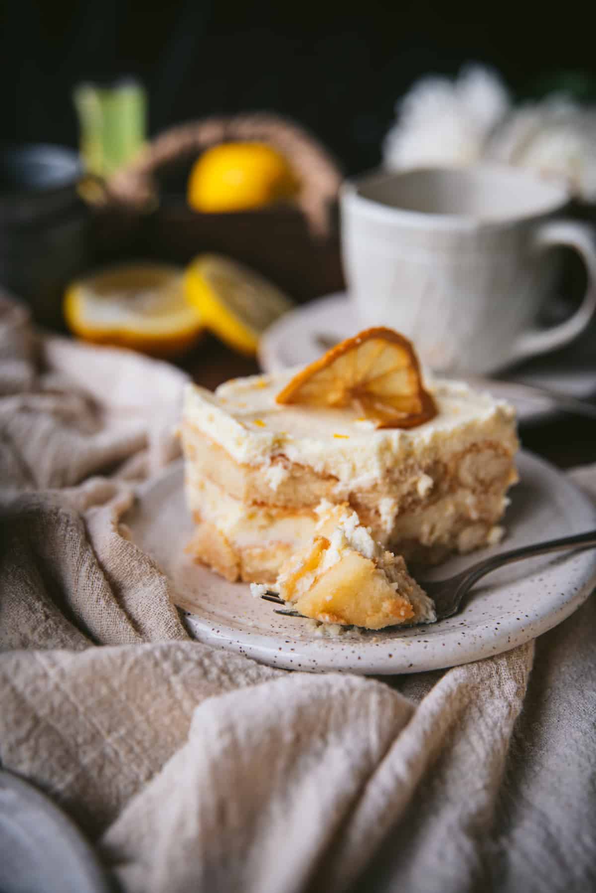 close up of bite of tiramisu on a fork