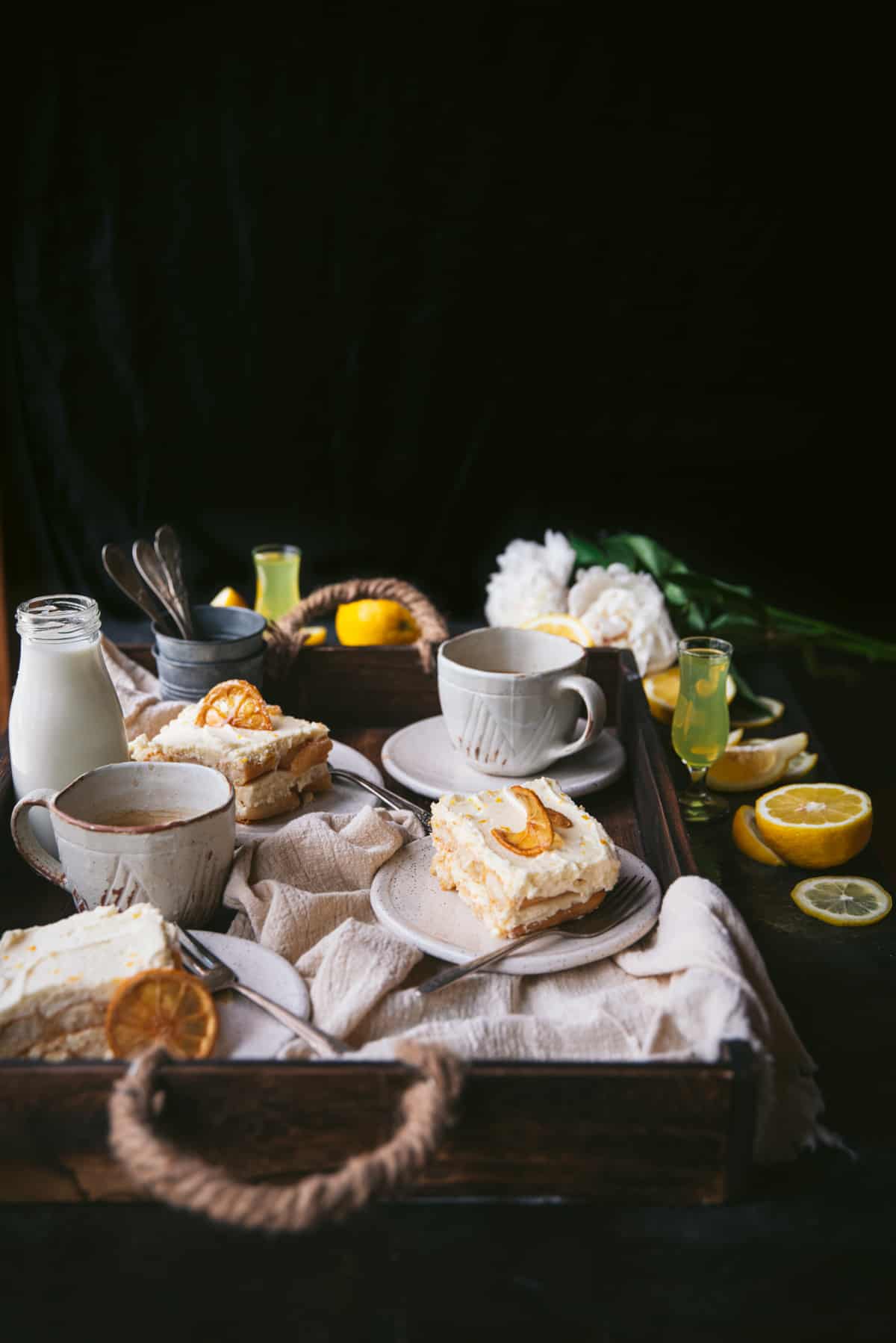slices of limoncello tiramisu on a serving tray with coffee