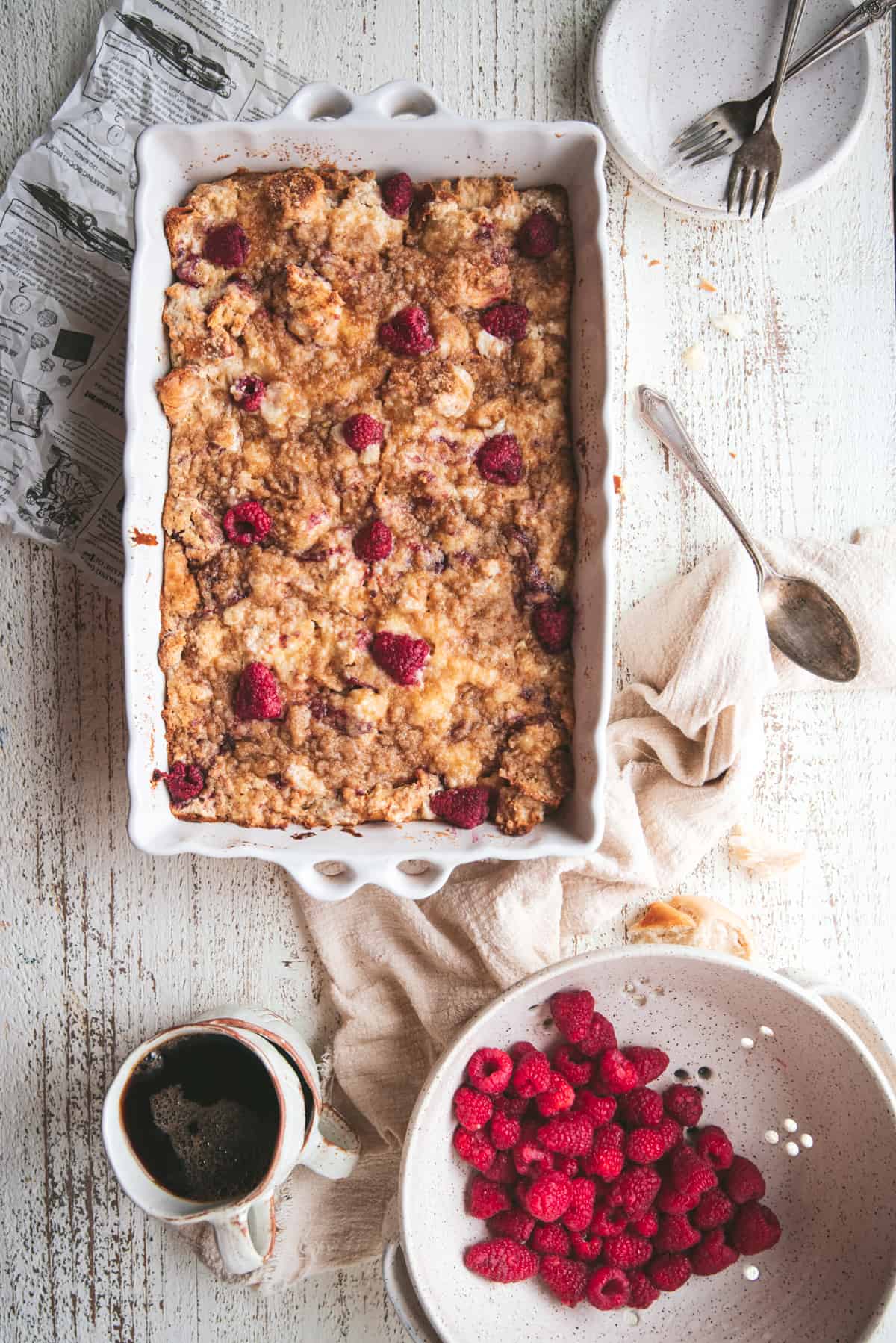 overhead of cooked french toast bake with fresh raspberries