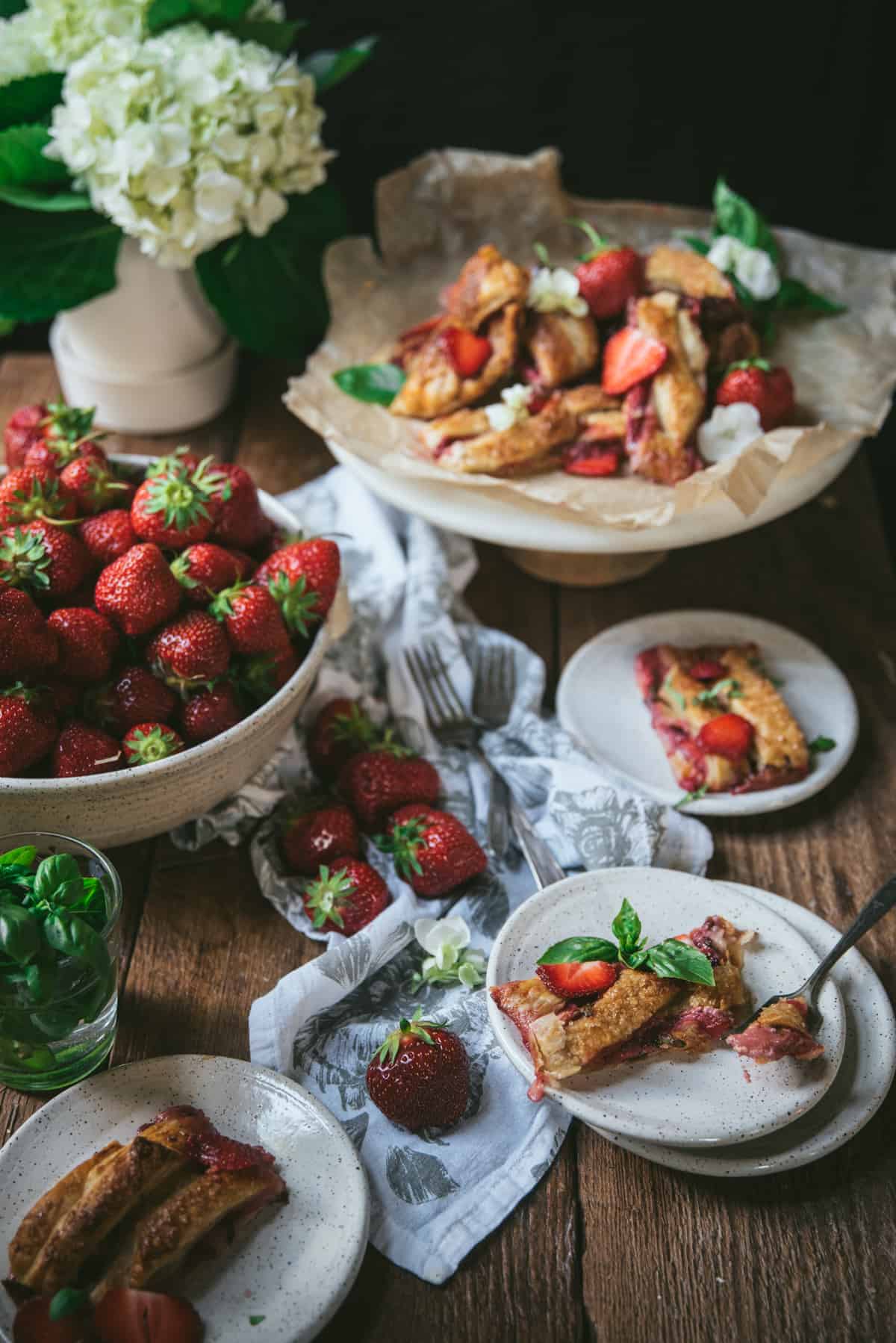 tablescape of finish puff pastry on different servingware