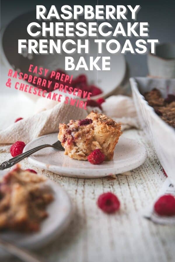 piece of french toast bake on a plate with a fork surrounded with fresh berries