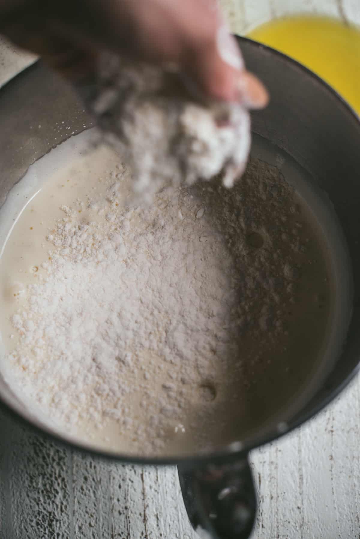 sprinkling dry ingredients over batter