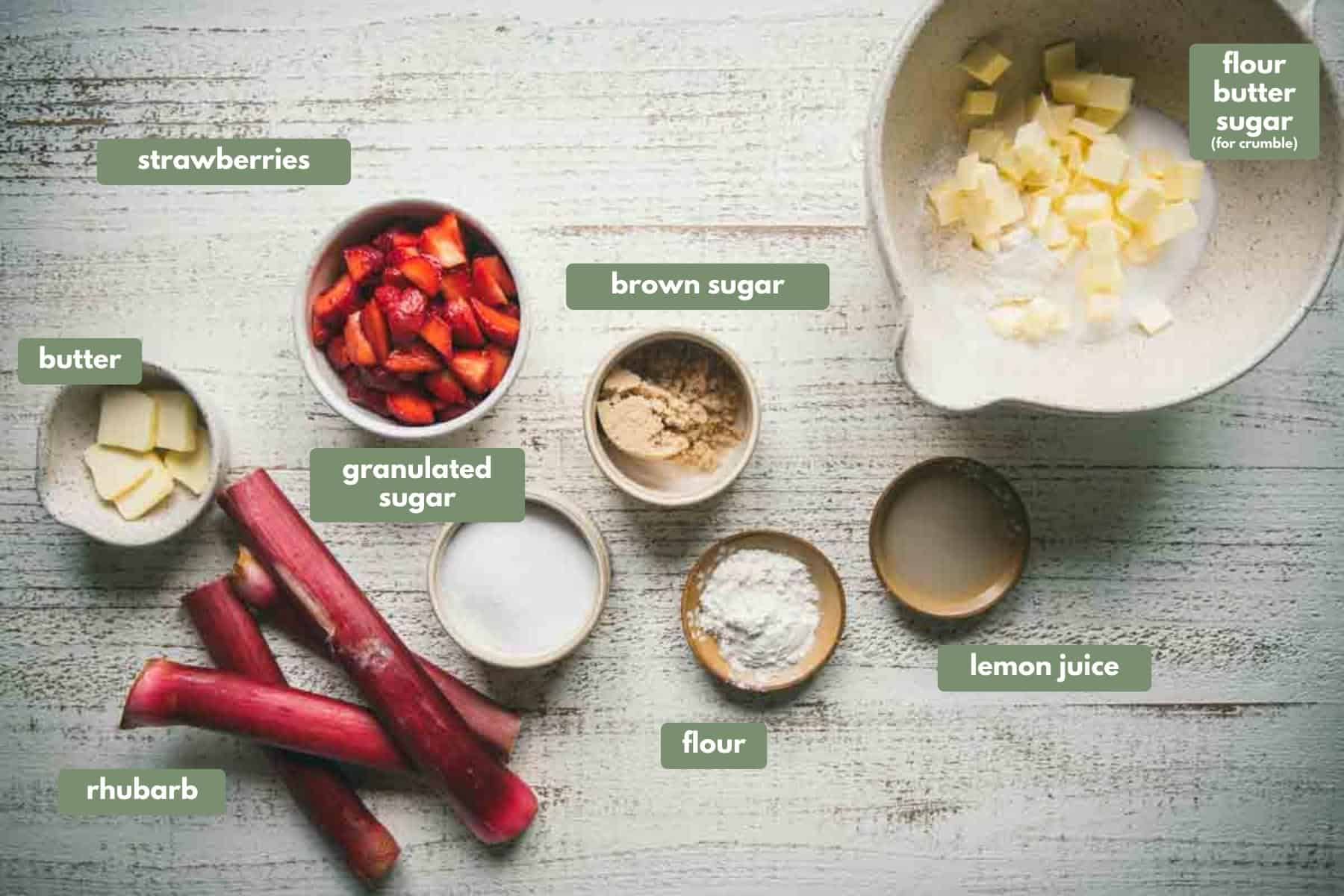 overhead image of labeled ingredients to make strawberry rhubarb crumble